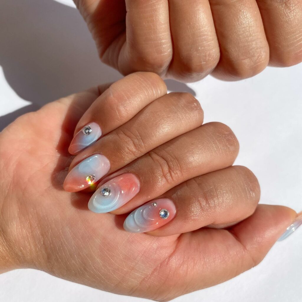 Gemstone-Encrusted Seashell Nails