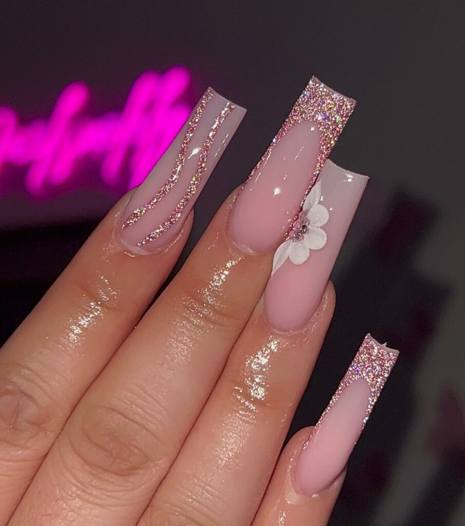 Glitter-Infused Nude Pink Acrylic Nails