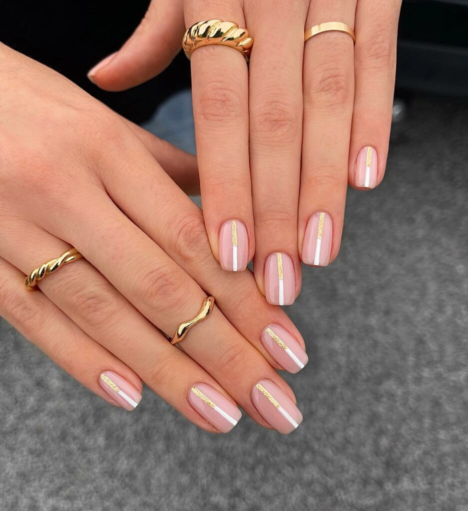 Gold short white nails