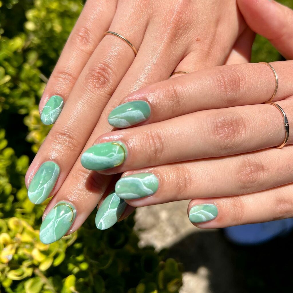 Emerald Green Nails with a Marbled Gold Foil Fusion