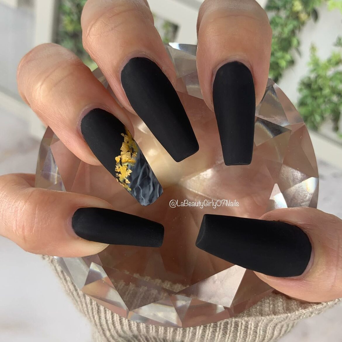 Elevate Your Style with 65 Black and Gold Nail Designs for 2024