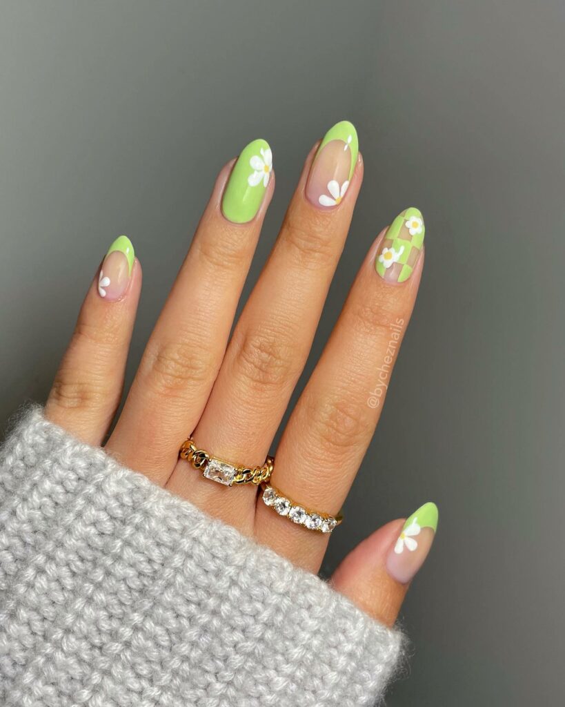 Light Green Nails Adorned with Daisies