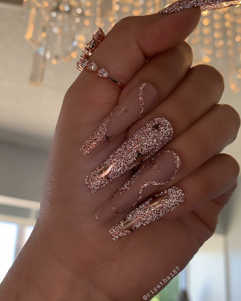 Nude with Glittery rose gold nails