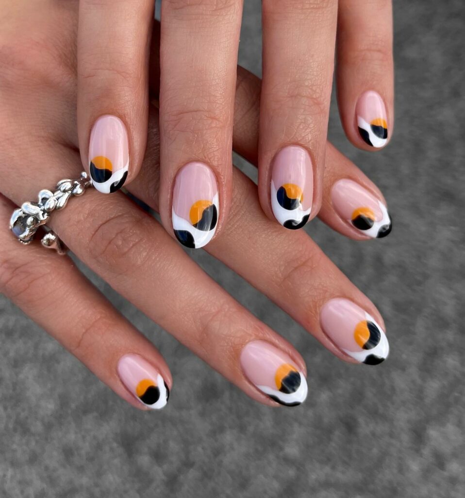 Oranges and short white nails