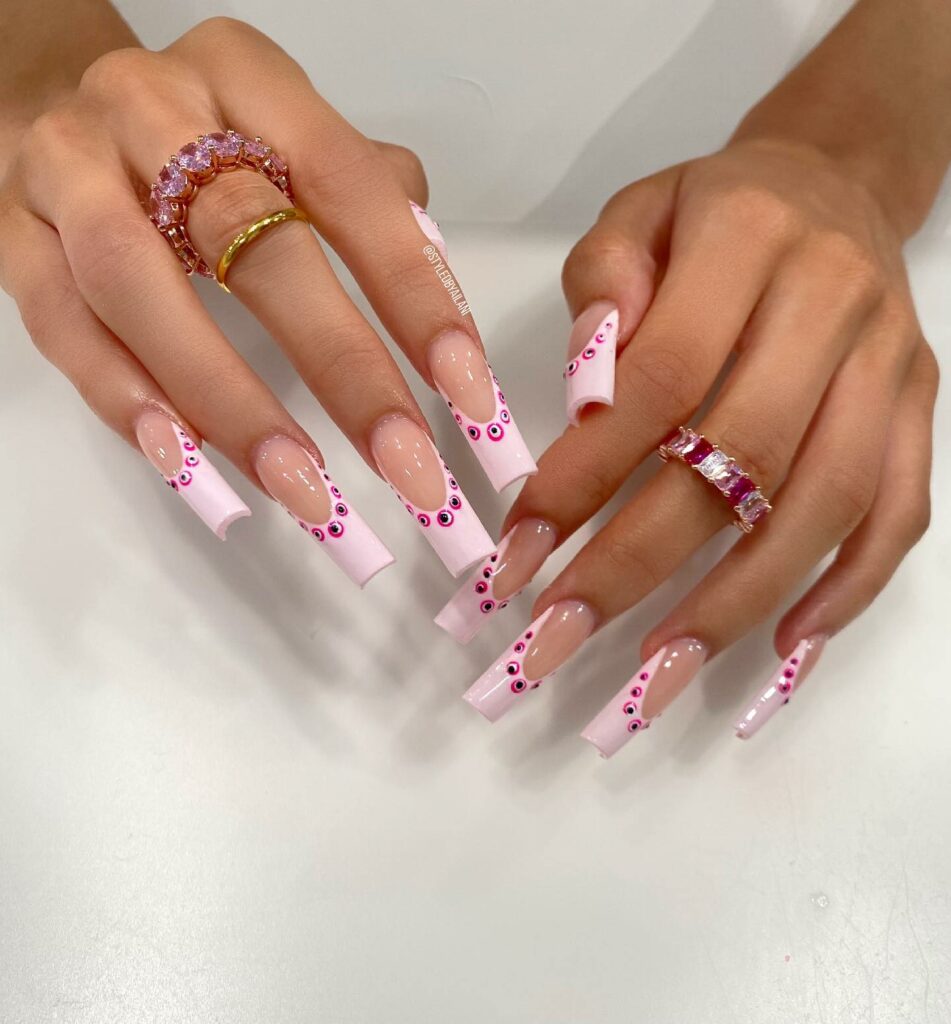 Pink evil eye nails