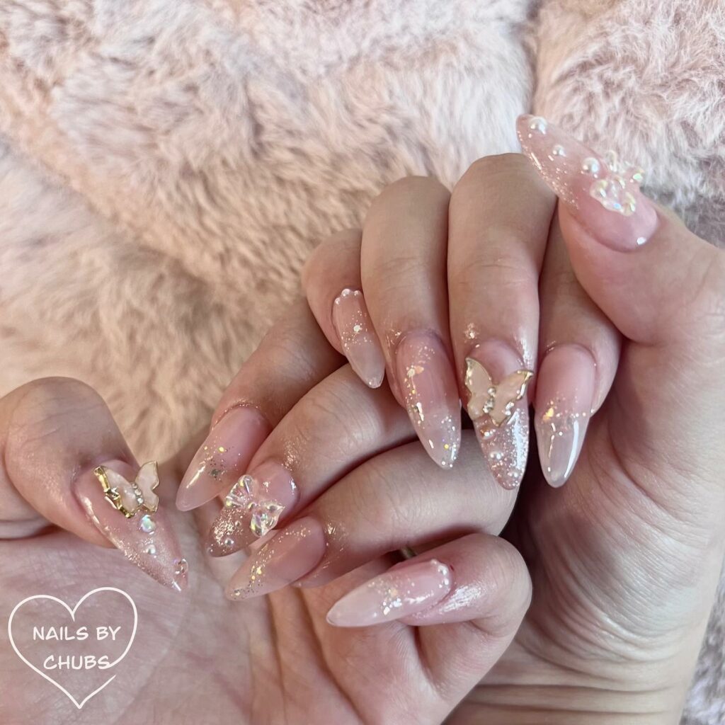 Pink nude combo with butterfly accents Glitter Nails