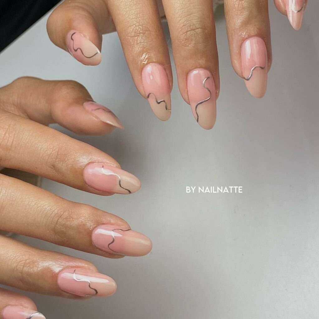 Silver Swirl Patterns on Nude Pink Nails