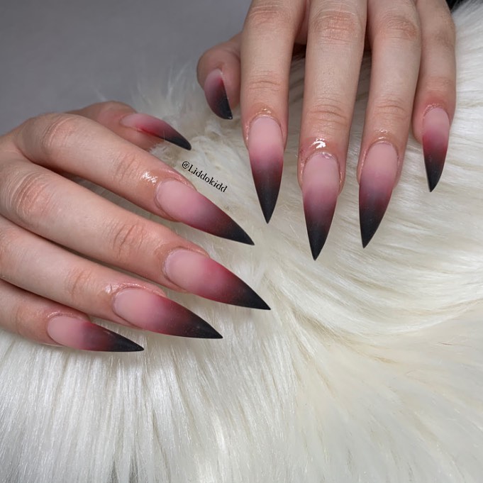 Edgy Sophistication with Stiletto Black Ombré Nails