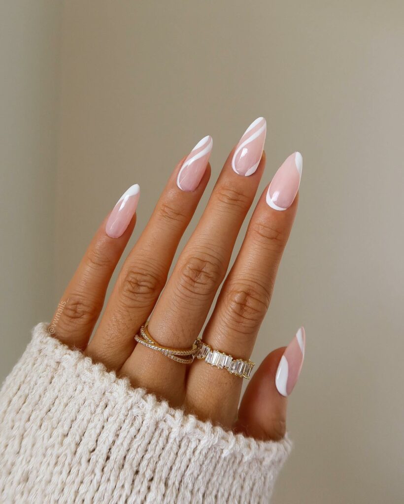 Light Pink Nails With White Swirls
