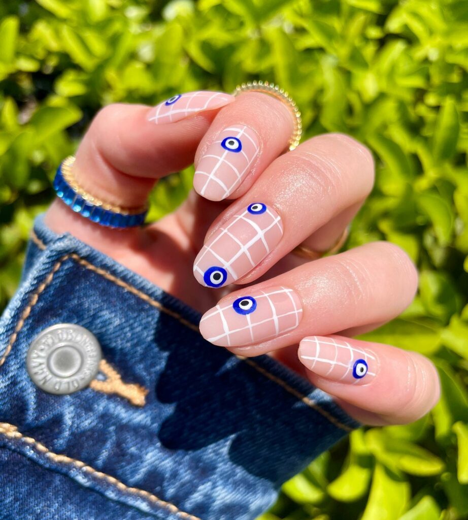 White-and-Gold evil eye nails