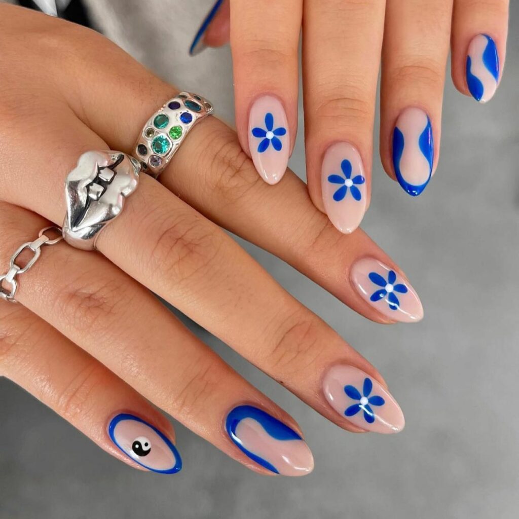Yin Yang Nails with Floral Blue Accents