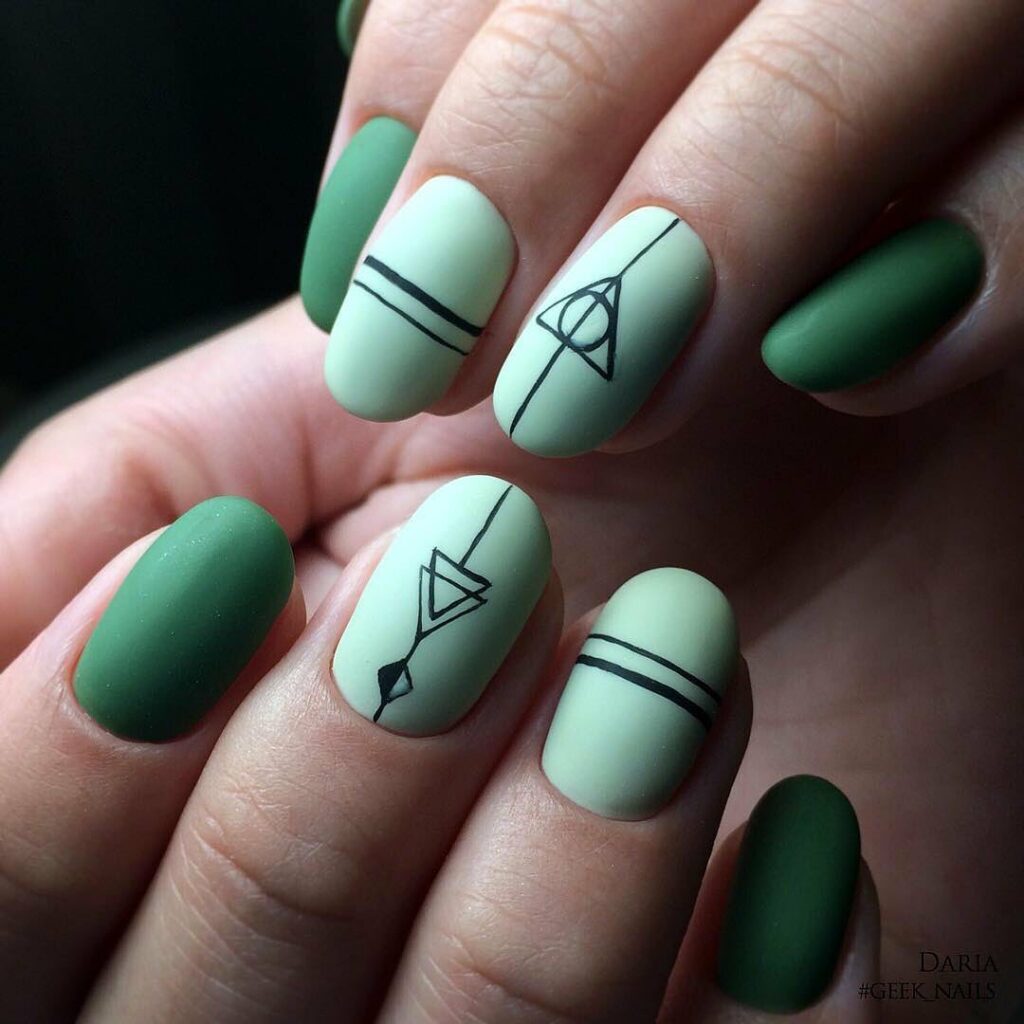 Matte Green Nails With Death Hollows Design
