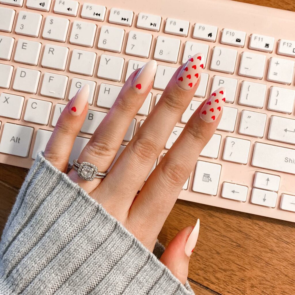 February Almond Nails With Tiny Heart Design