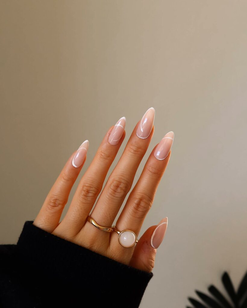 Almond Thin French Tip Nails With Swirl