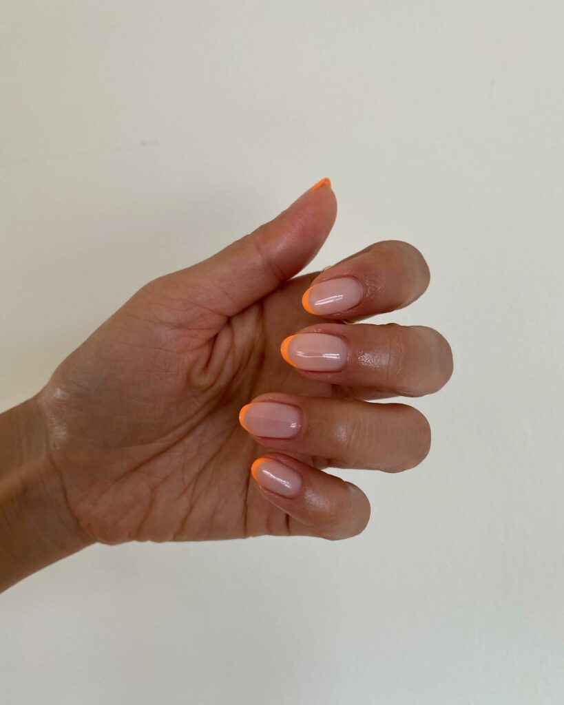 Thin Orange French Tip Almond Nails