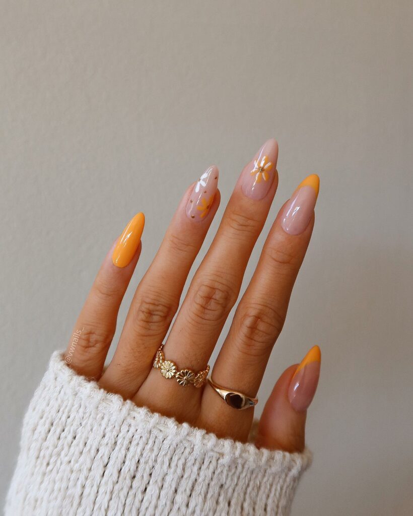 Orange French Nails With Daisy Flowers And Gold Dots
