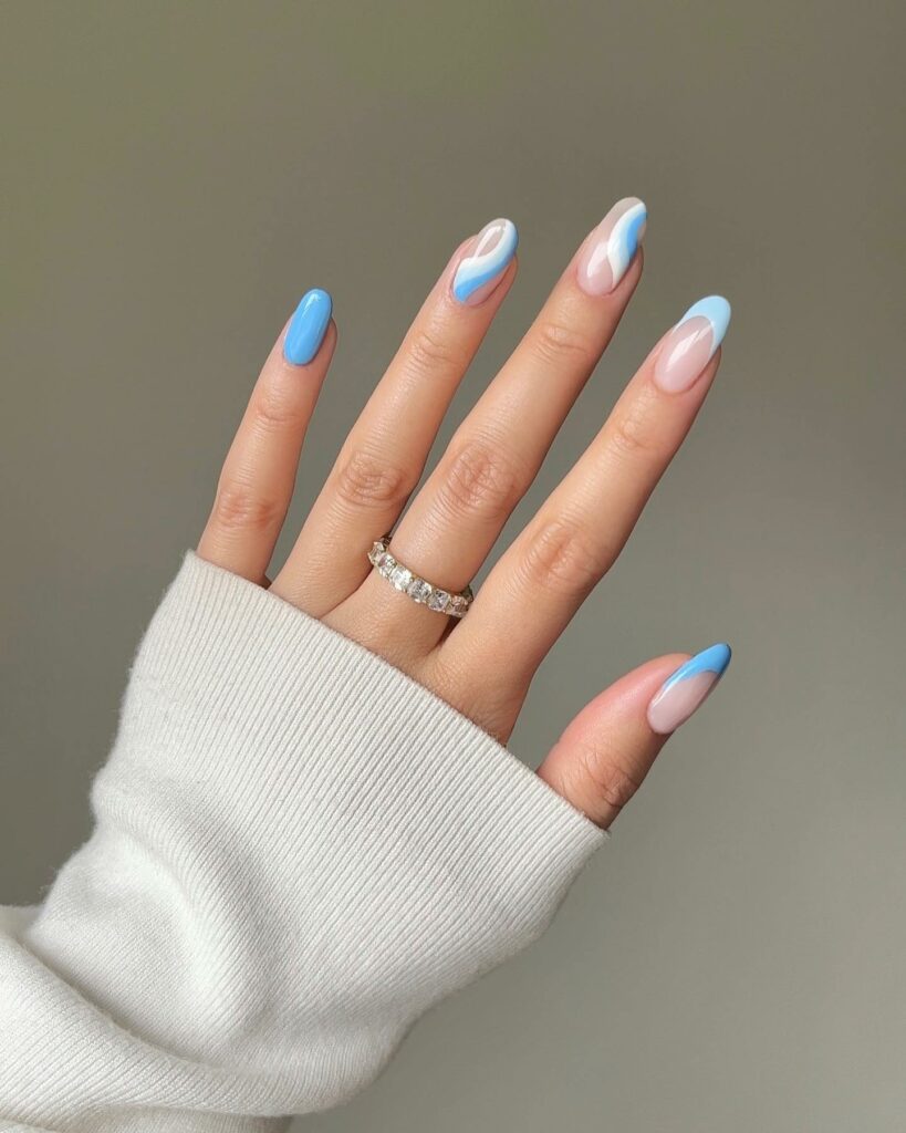 White And Blue Swirl Nails