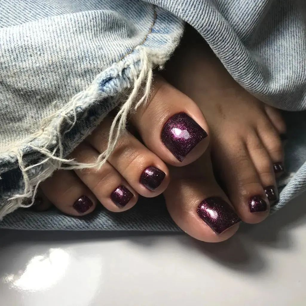 Dark Purple Pedicure With Glitter