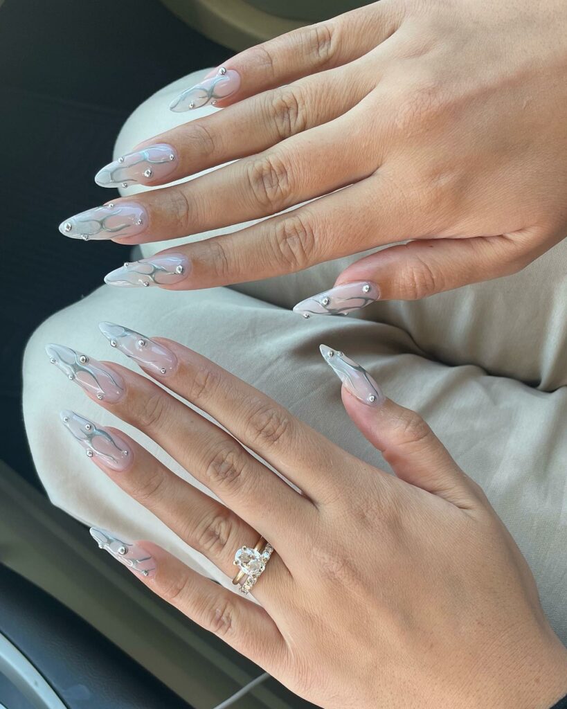 White Pearl Nails With Silver Tribal Design