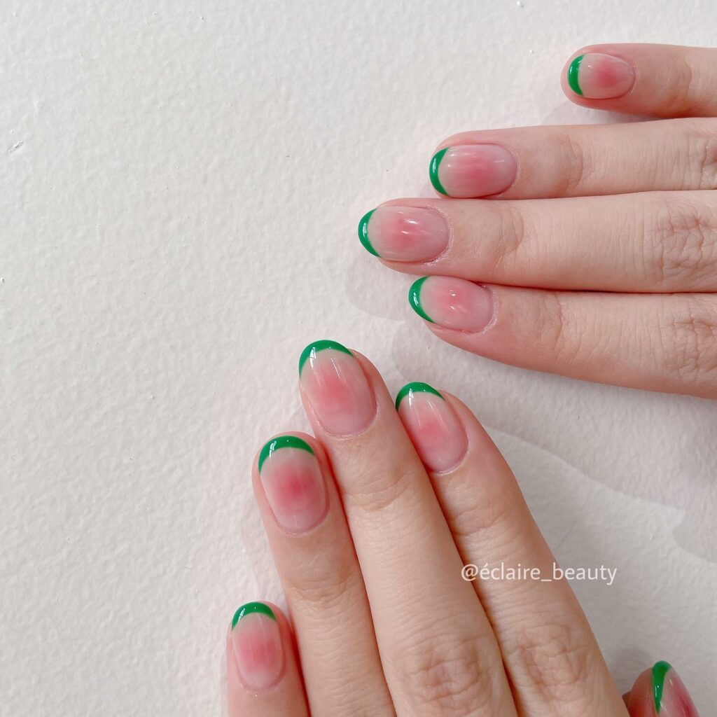 Pink Aura Nails With Thin Green French 