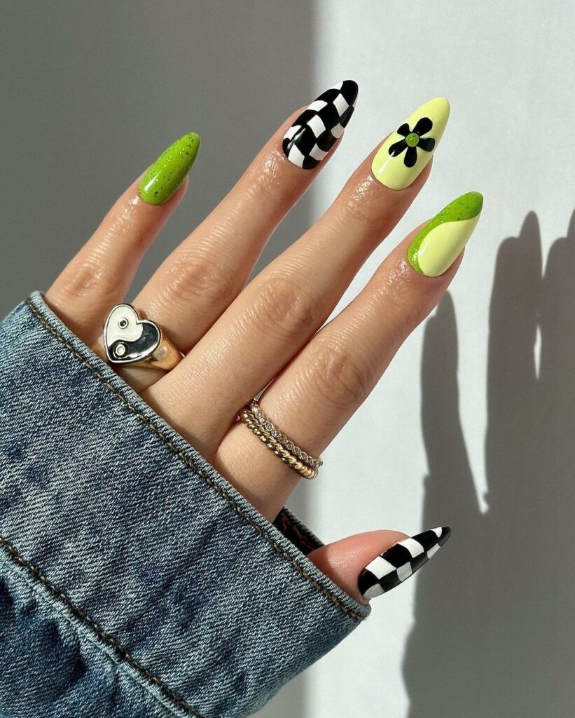 Light Green And Black Nails With Swirl, Checkered, And Flower Design