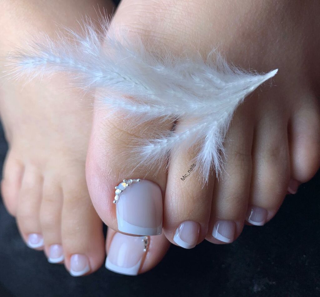 Milky White French Pedicure With Rhinestones