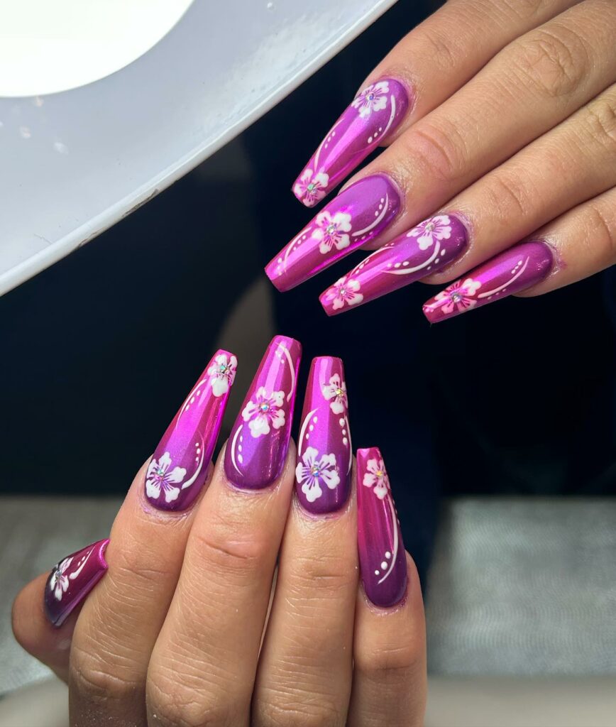 Metallic Purple Nail With White Flower Design