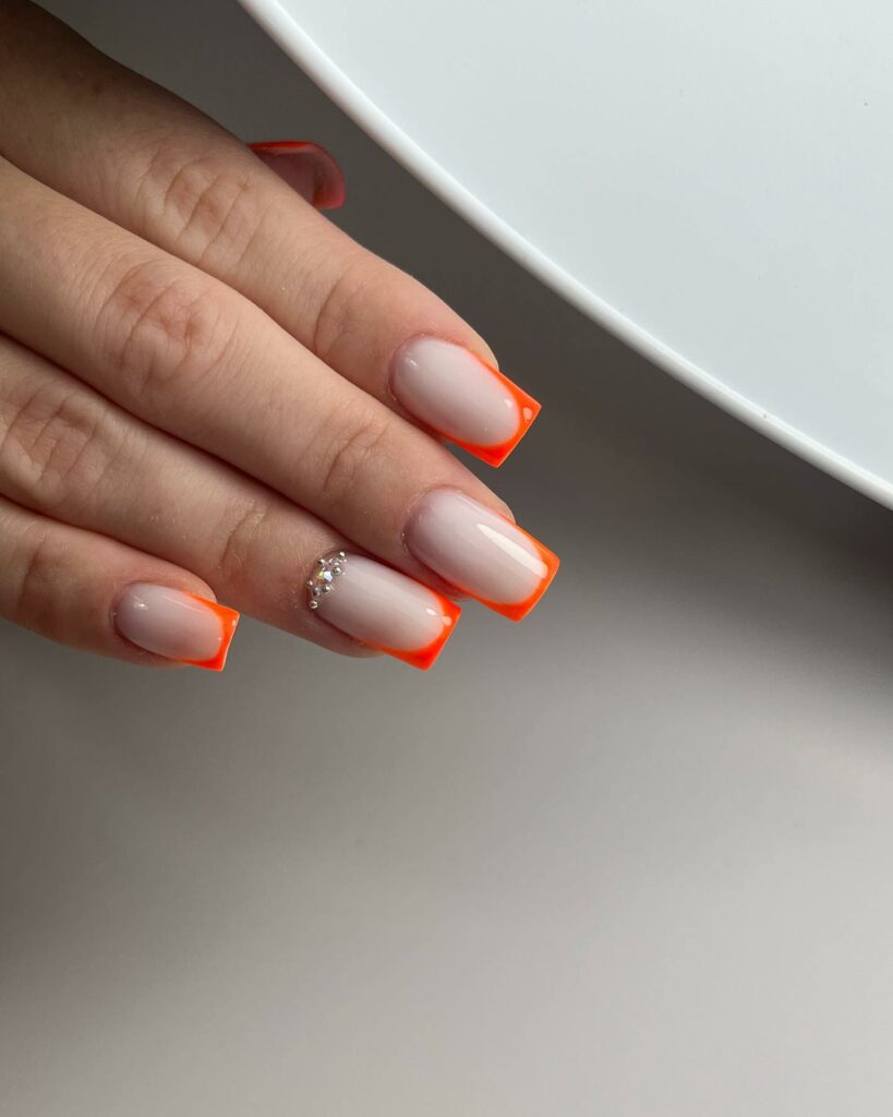 Thin Orange French Tip Square Nails With Rhinestones