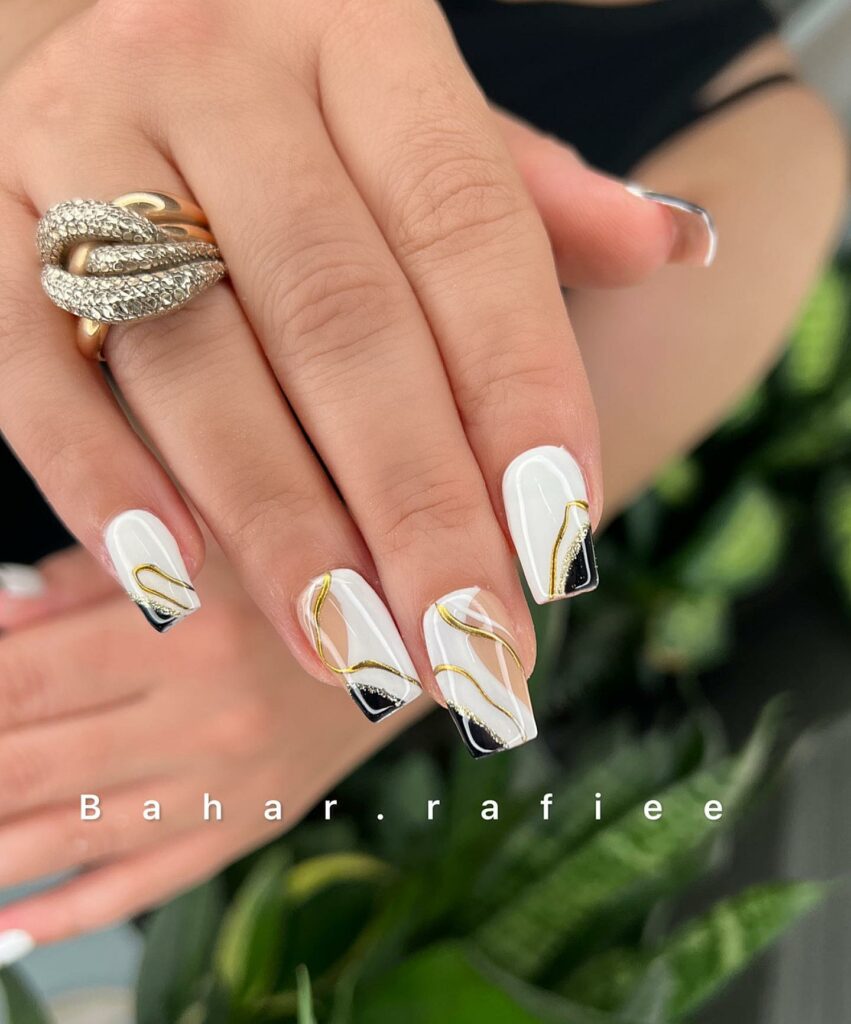 Tanya Inspires on X: White nails with gold flakes   #nailart #naildesign #nailflakes #nails #whitenails #manicure   / X