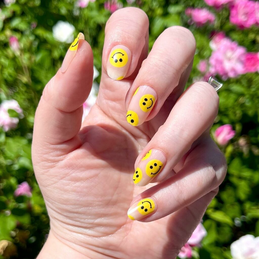 Bright Yellow Smiley Nails