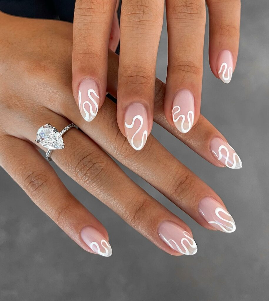 Nude And White Small Almond Swirl Nails 