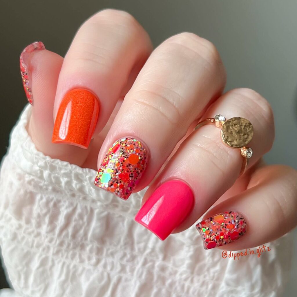 Pink And Orange Nails With Glitter