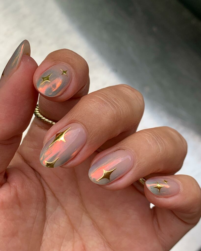 Nude Nails with Gold Star Design