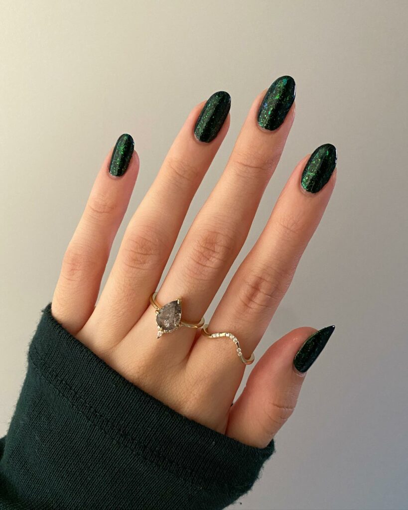 Almond Green And Black Nails With Glitter