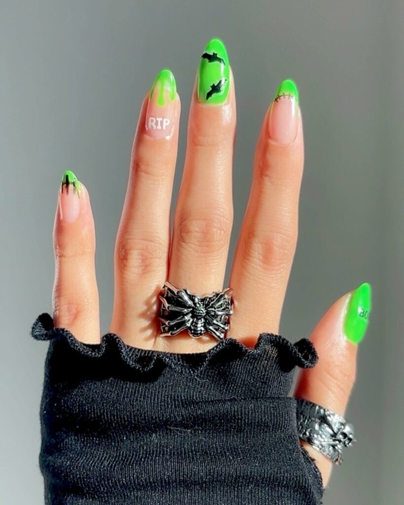 Halloween-Inspired Green And Black Nails