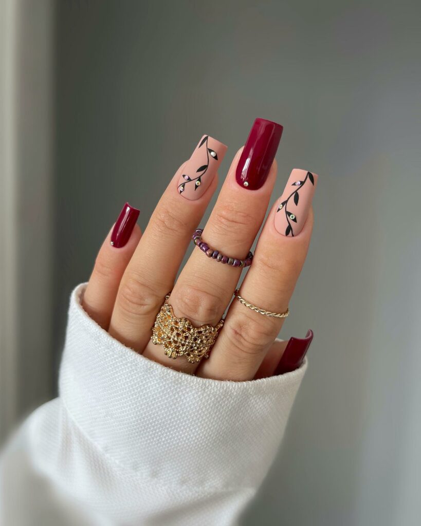 Red Nails with Abstract Face Line Art