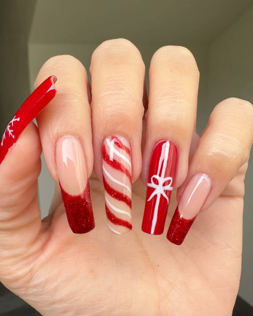 Lustrous Acrylic Nails with Candy Cane Designs
