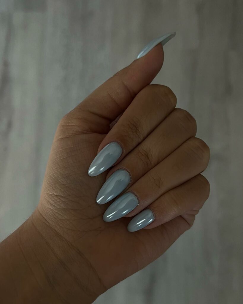 Serene Beauty of Almond Light Blue Chrome Nails