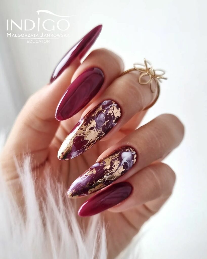 Burgundy and Gold Almond Shaped Nails