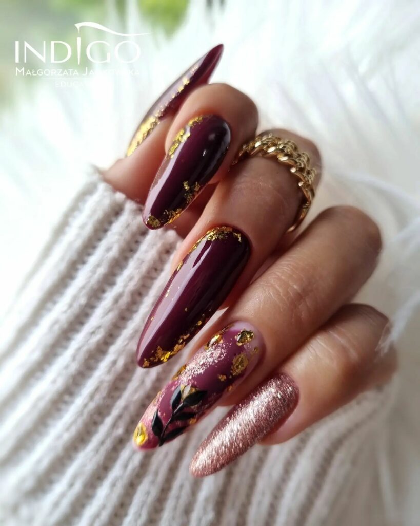 Artistic Burgundy and Gold Nails
