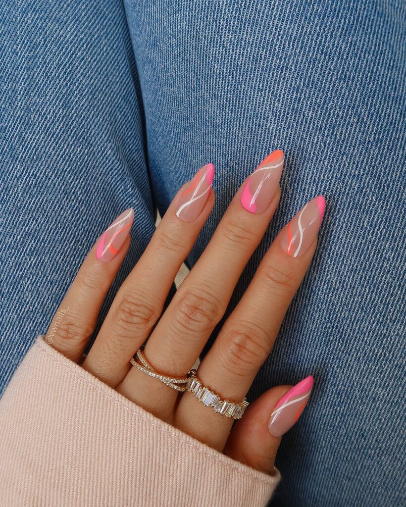 Swirling Designs on Light Pink Nails