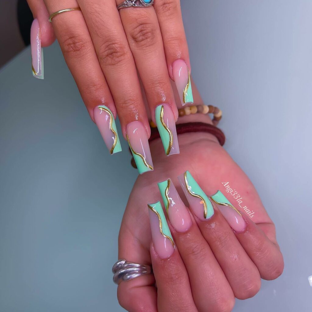 Sleek Coffin Mint Green Nails with Gold Swirl
