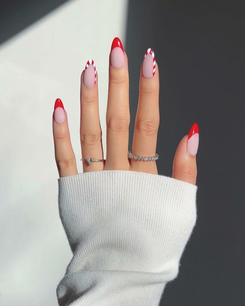 Elevated French Tips with Candy Cane Stripes
