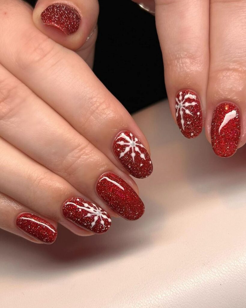 Sparkling Ruby Snowflake Nails
