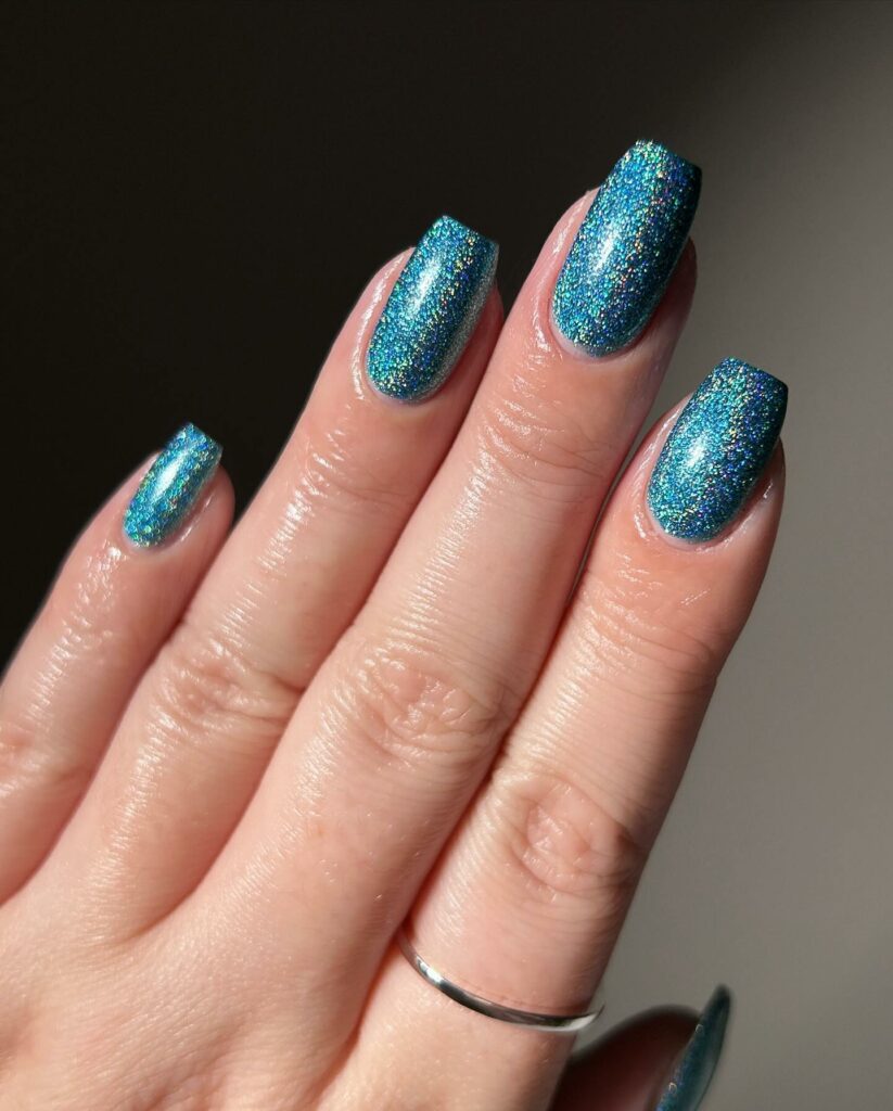 Glittery Icy Blue Frozen Inspired Nails