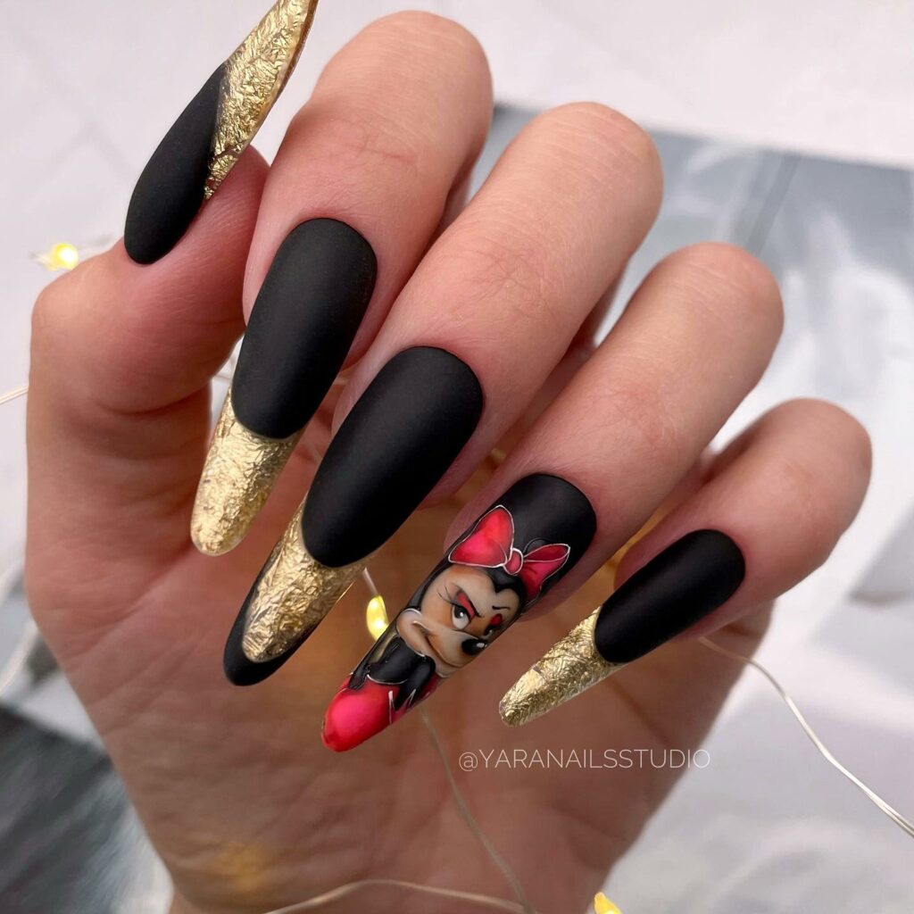 Gold Accents with Matte Black Cartoon Nails