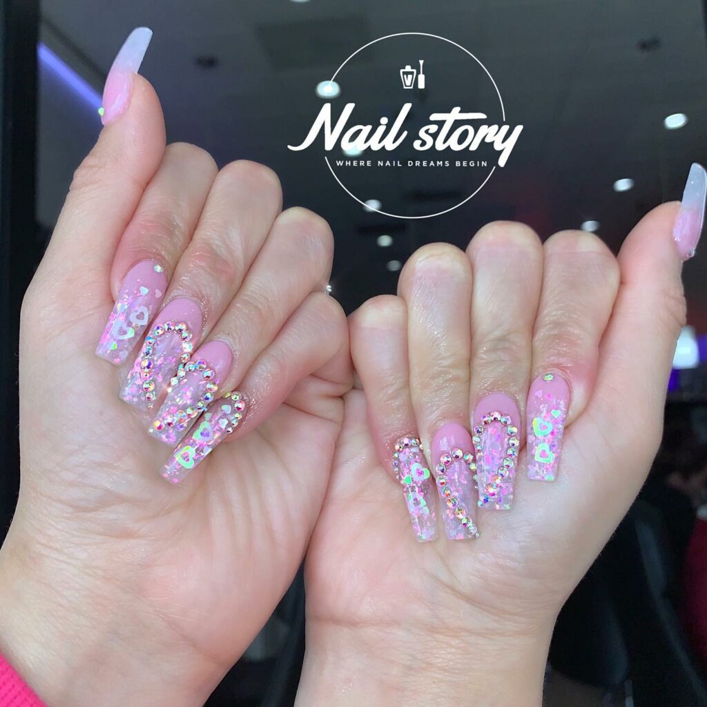 Heart Motifs on Light Pink Nails