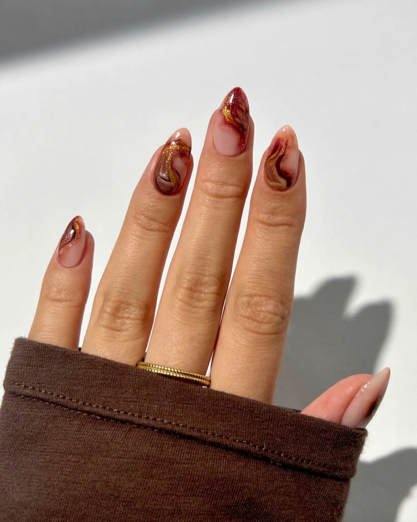 Marble Effect Burgundy and Gold Nails