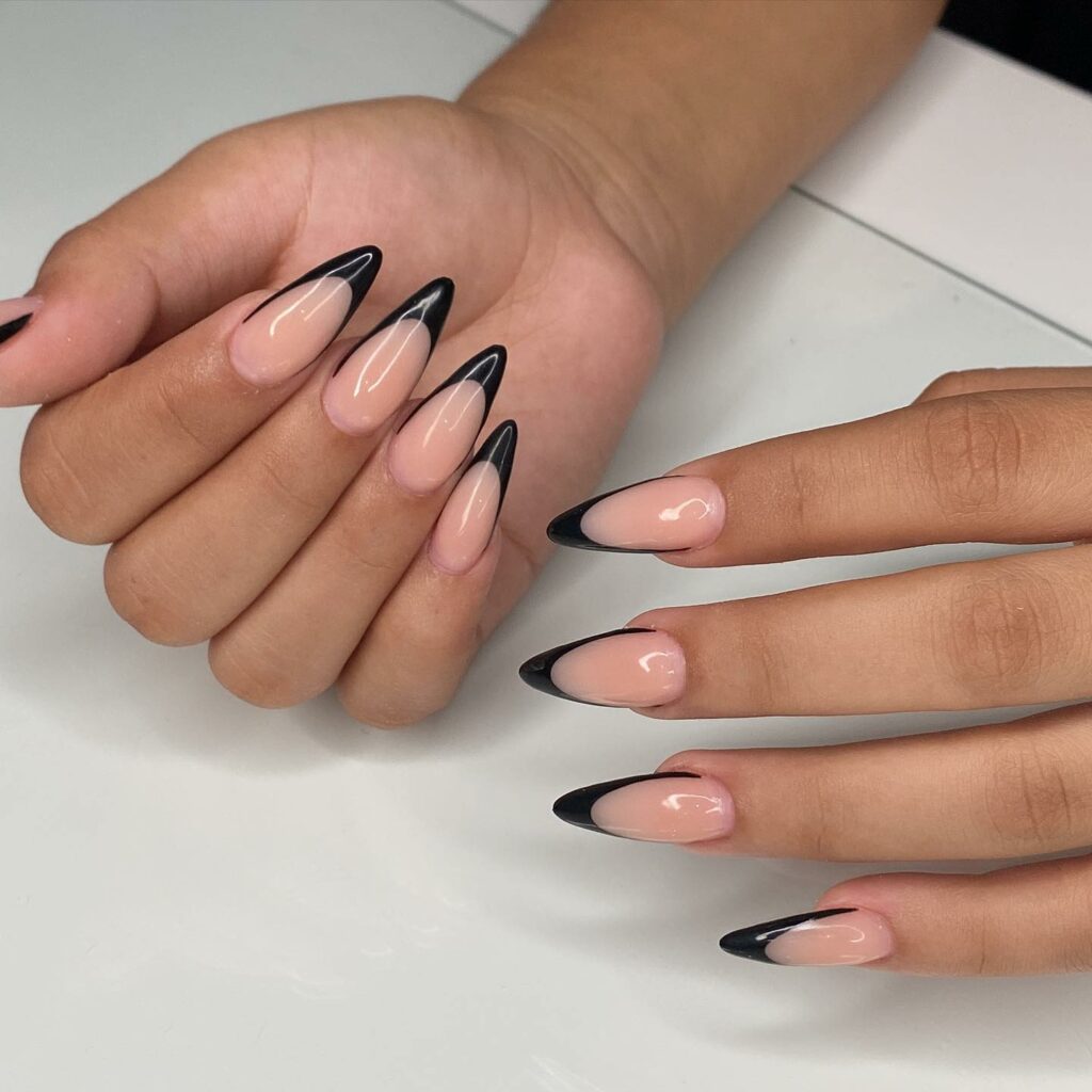 Soft Contrast with Nude Black Almond Nails
