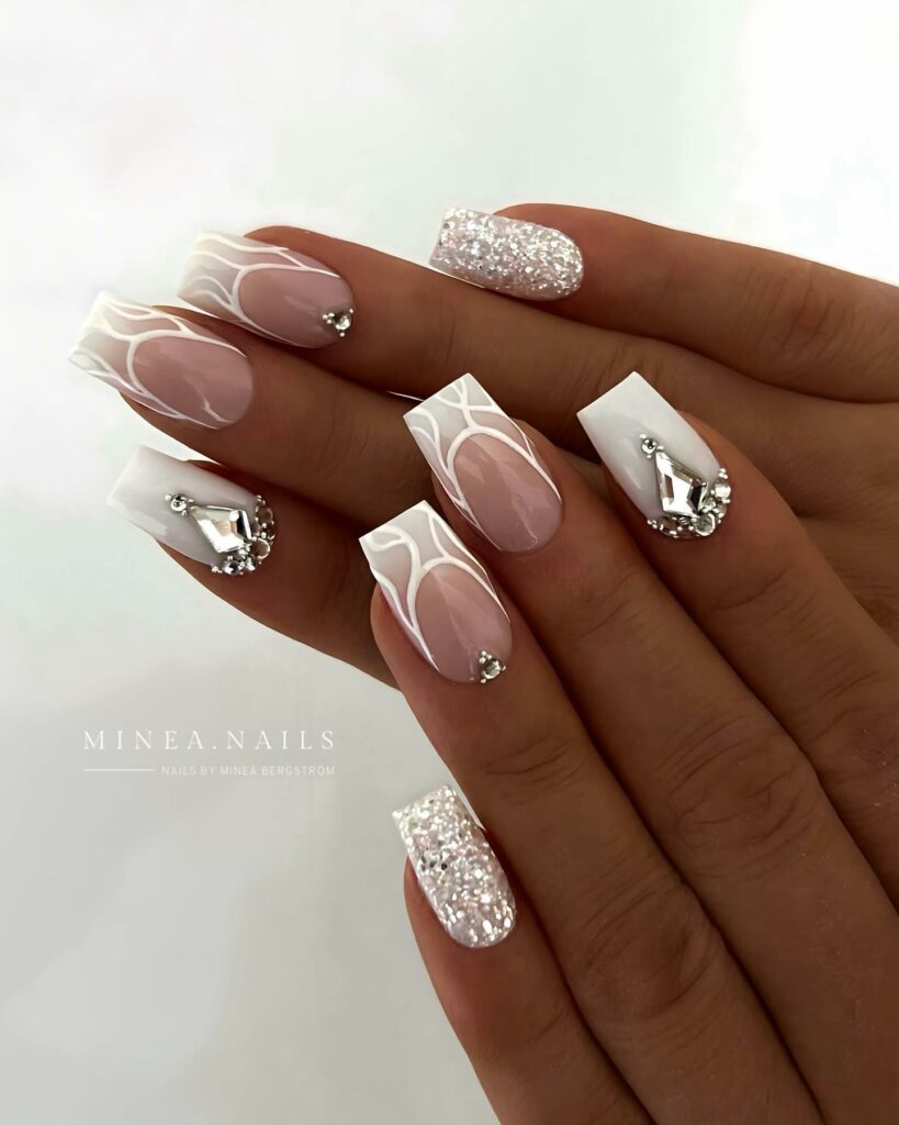 Nude and White Nails with Artistic Flair